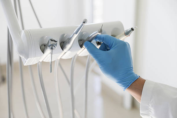 Professional Tooth Extraction technician working in Long Lake, IL